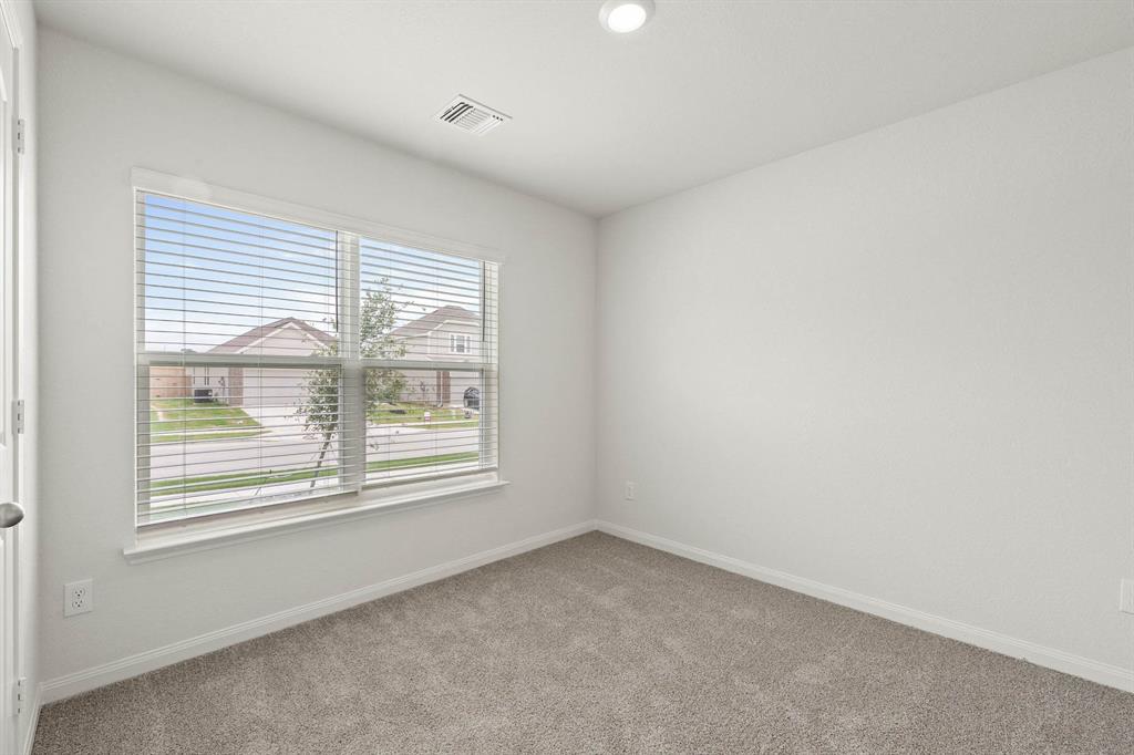 9964 Voyager Lane Fort Worth, TX 76131 - Photo 8 of 10 an empty room with a window