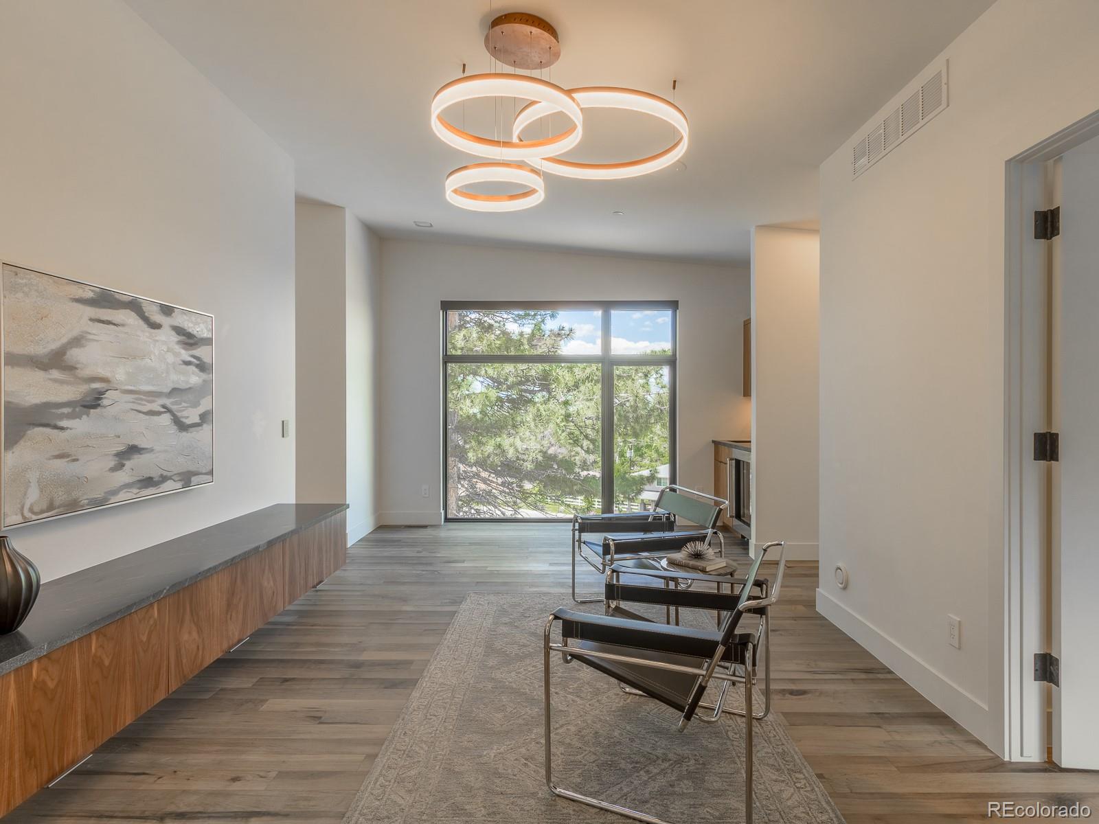 7526 Spring Drive Boulder, CO 80303 - Photo 30 of 40 a living room with furniture and a window