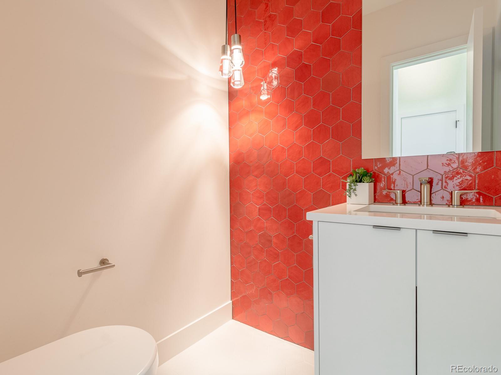 7526 Spring Drive Boulder, CO 80303 - Photo 37 of 40 a bathroom with a sink and a mirror