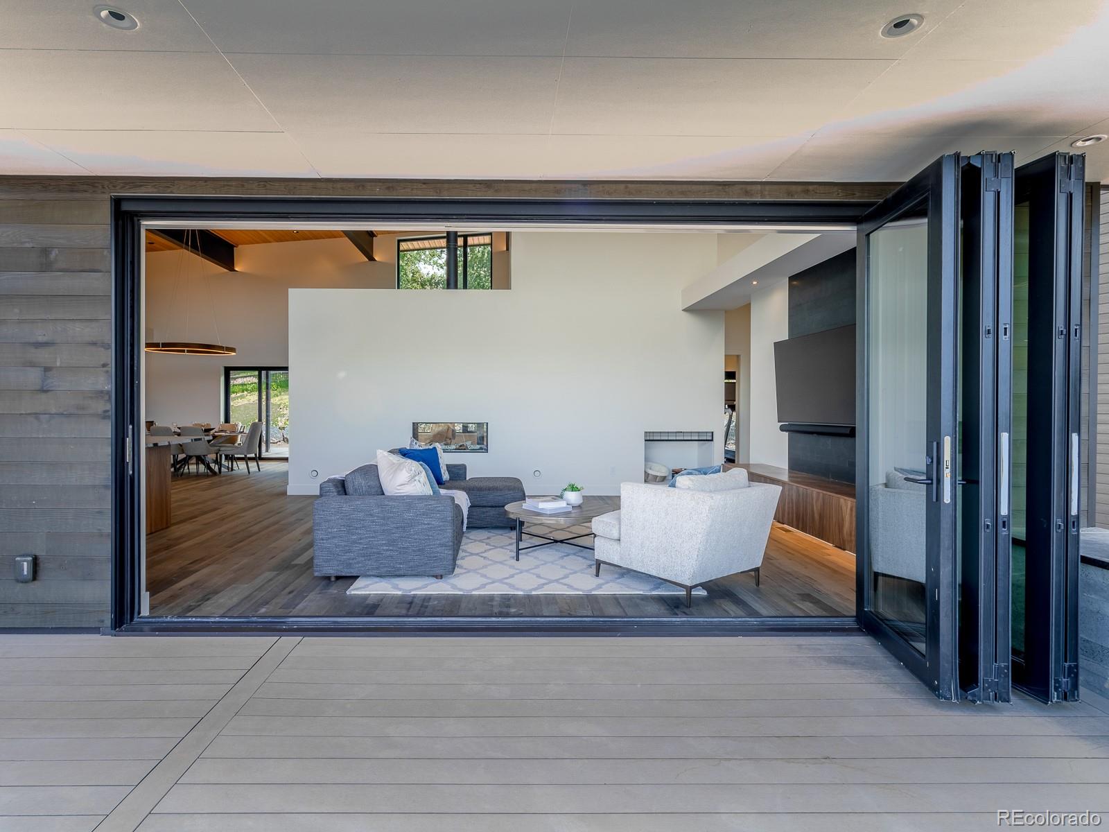 7526 Spring Drive Boulder, CO 80303 - Photo 8 of 40 a living room with furniture and wooden floor