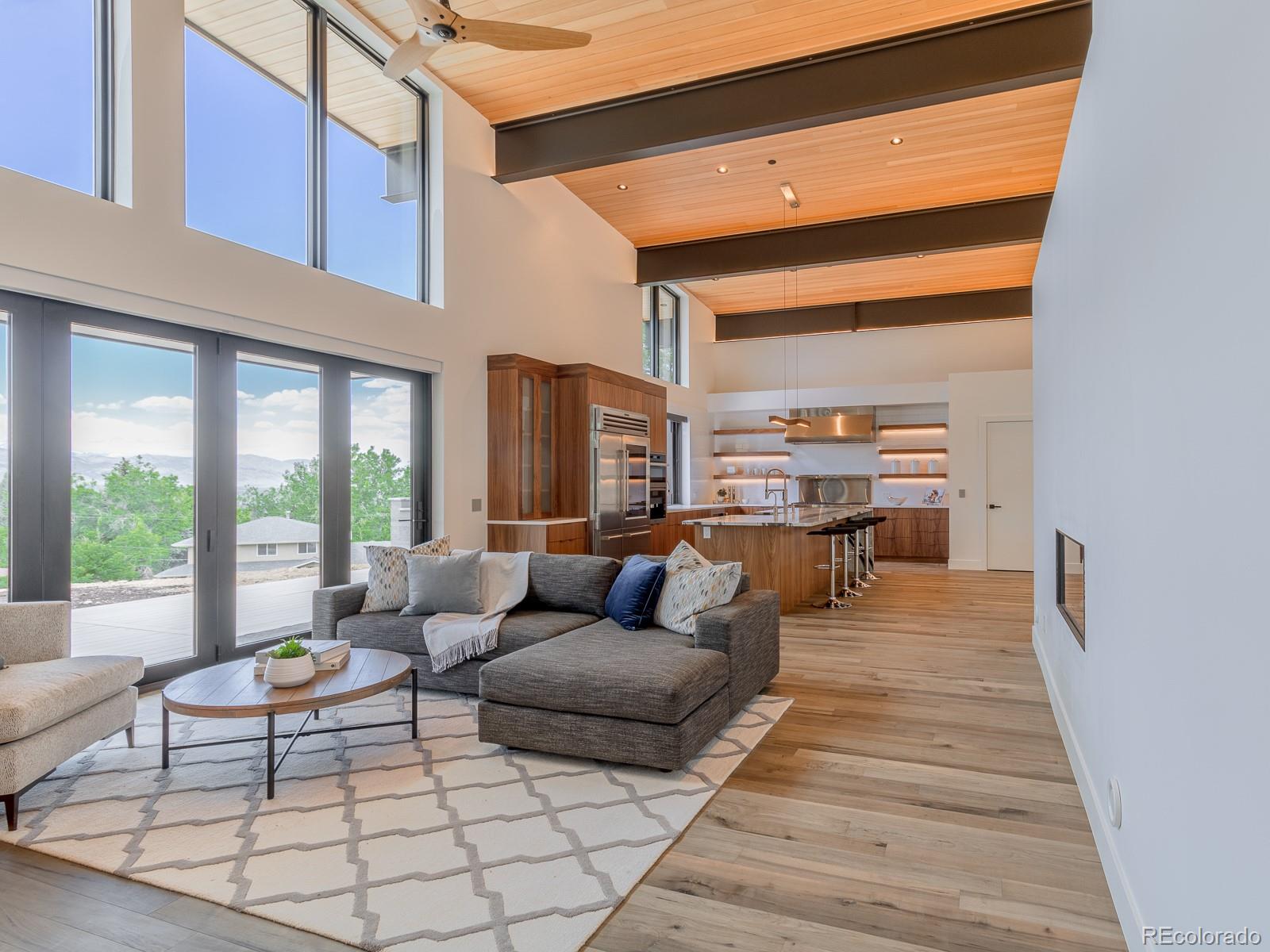 7526 Spring Drive Boulder, CO 80303 - Photo 9 of 40 a living room with furniture and a large window