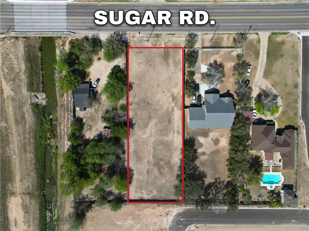 3120 South Sugar Road Edinburg, TX 78539 - Photo 4 of 4 a signage on a wall with a street