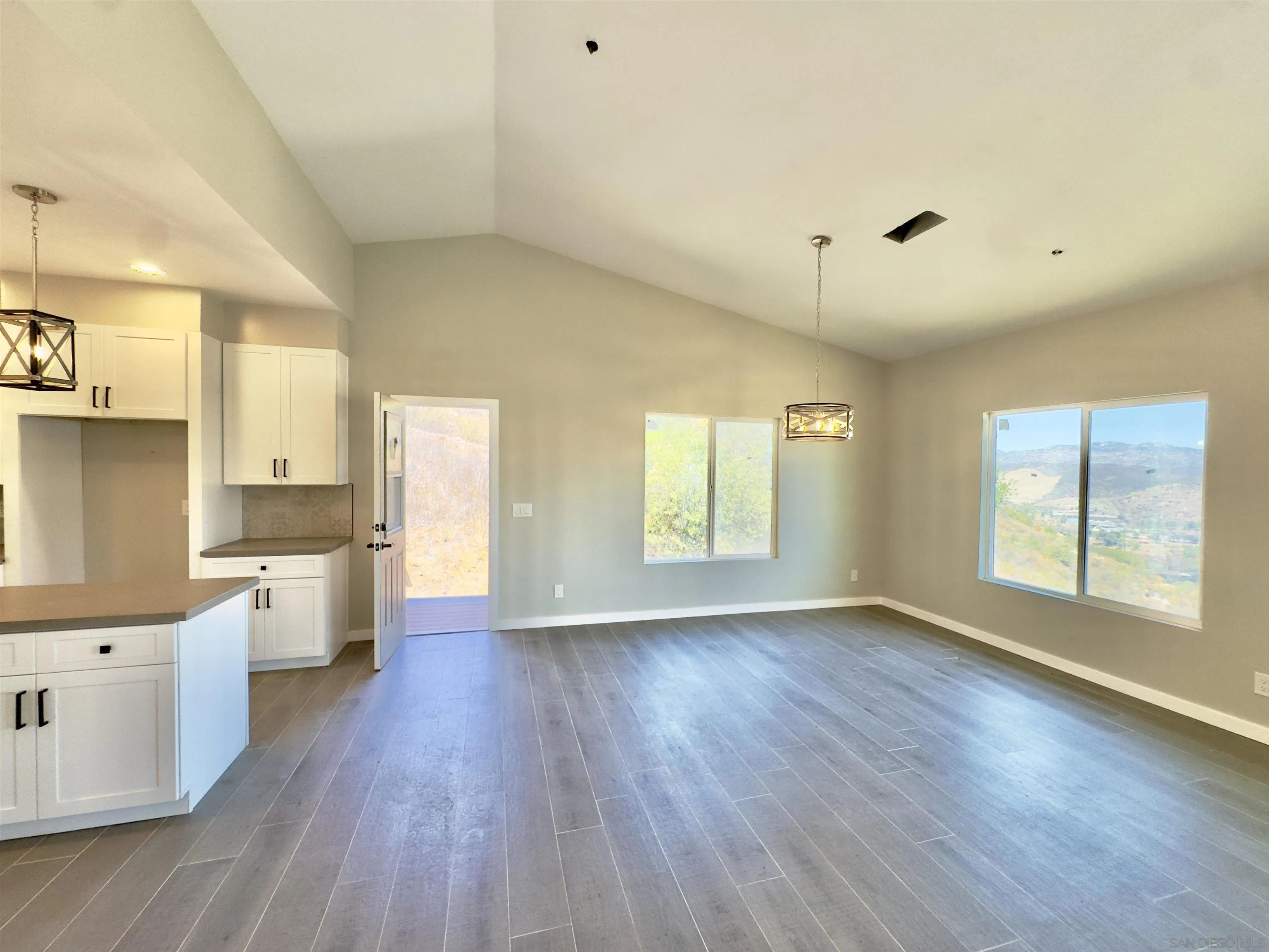 11677 Valle Vista Road Lakeside, CA 92040 - Photo 14 of 44 a view of a kitchen and wooden floor