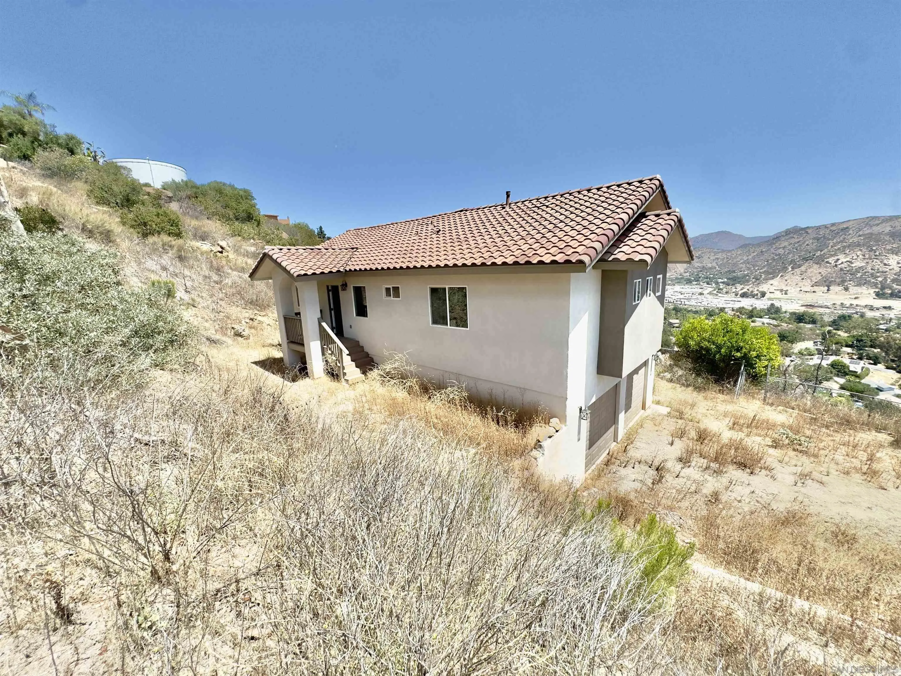 11677 Valle Vista Road Lakeside, CA 92040 - Photo 3 of 44 a back yard of the house