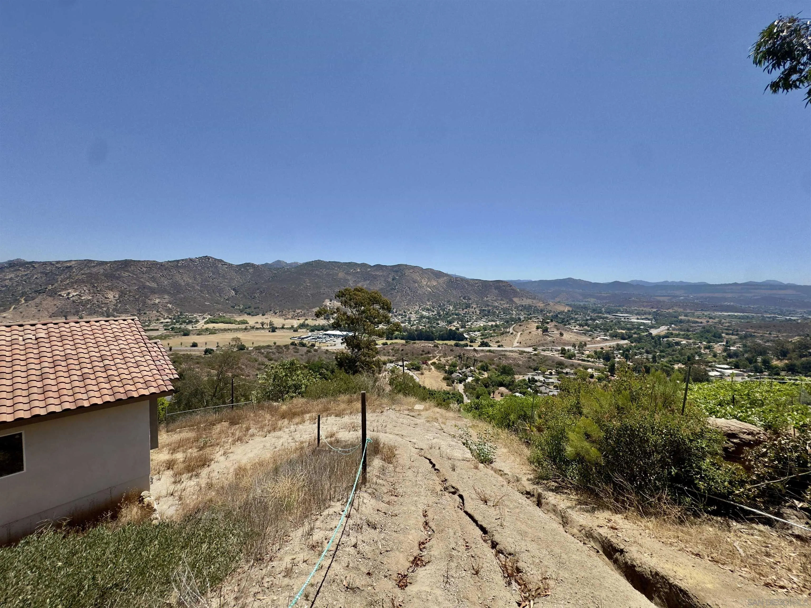 11677 Valle Vista Road Lakeside, CA 92040 - Photo 8 of 44 a view of a lake with a mountain in the background