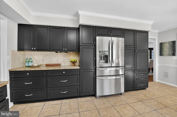 a view of a brick house with a large window