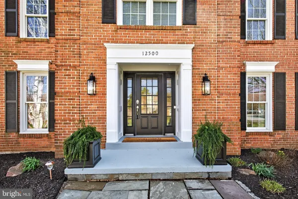 a workspace with furniture and window