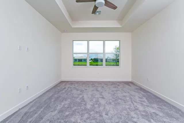 a bathroom with a sink vanity and a mirror