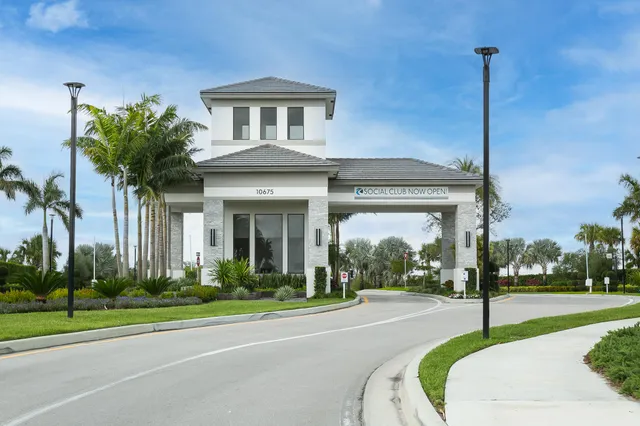 an aerial view of a house with outdoor space swimming pool and mountains