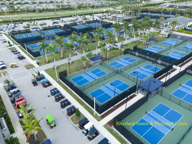 an aerial view of a house and outdoor space