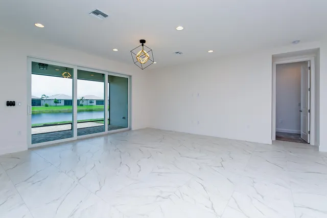 an empty room with a large window