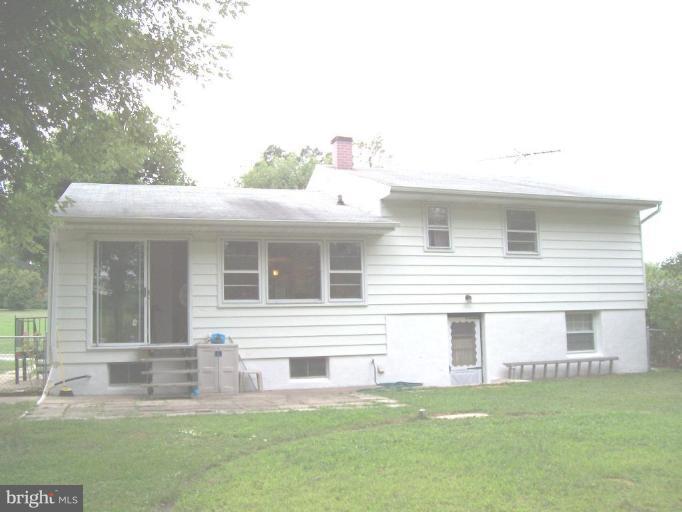 9105 Kilbride Road Nottingham, MD 21236 - Photo 13 of 13 a front view of a house with a yard