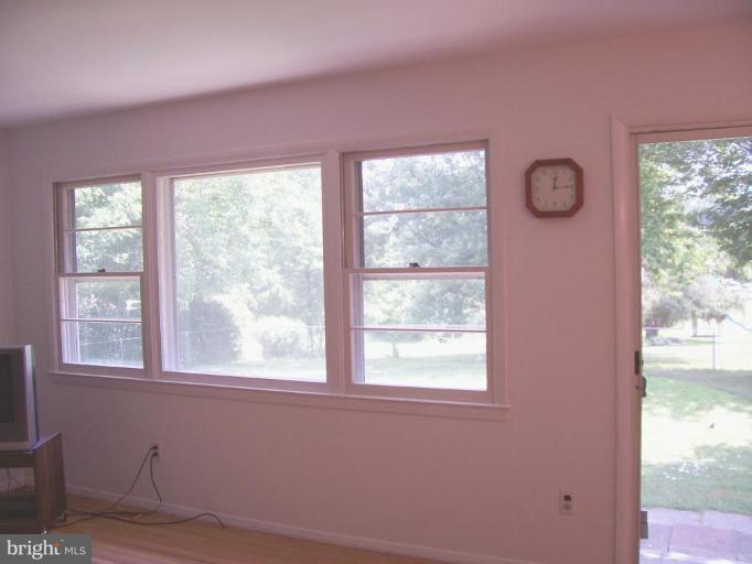 9105 Kilbride Road Nottingham, MD 21236 - Photo 8 of 13 a view of empty room with window