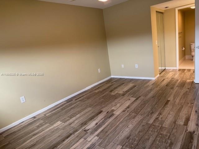 850 Southwest 138th Avenue, Unit 410D Pembroke Pines, FL 33027 - Photo 16 of 29 a view of a room with wooden floor
