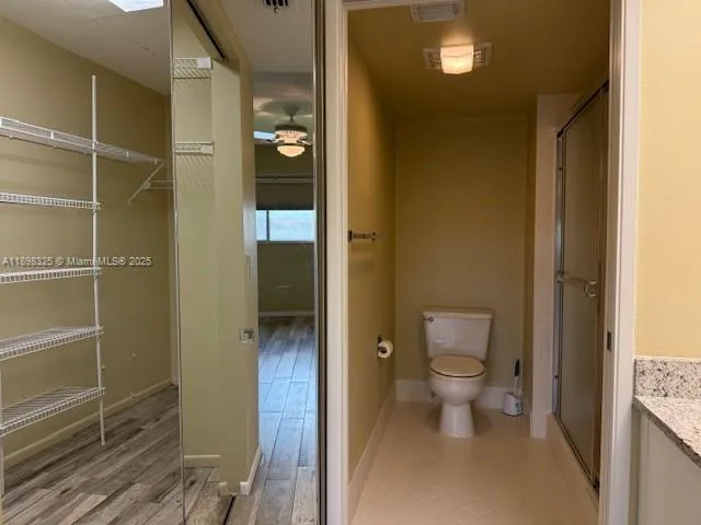 a bathroom with a toilet
