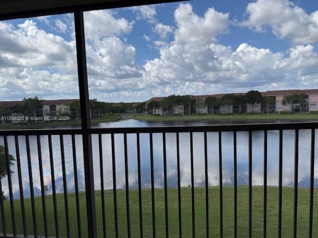 850 Southwest 138th Avenue, Unit 410D Pembroke Pines, FL 33027 - Photo 23 of 29 a view of a city from a balcony
