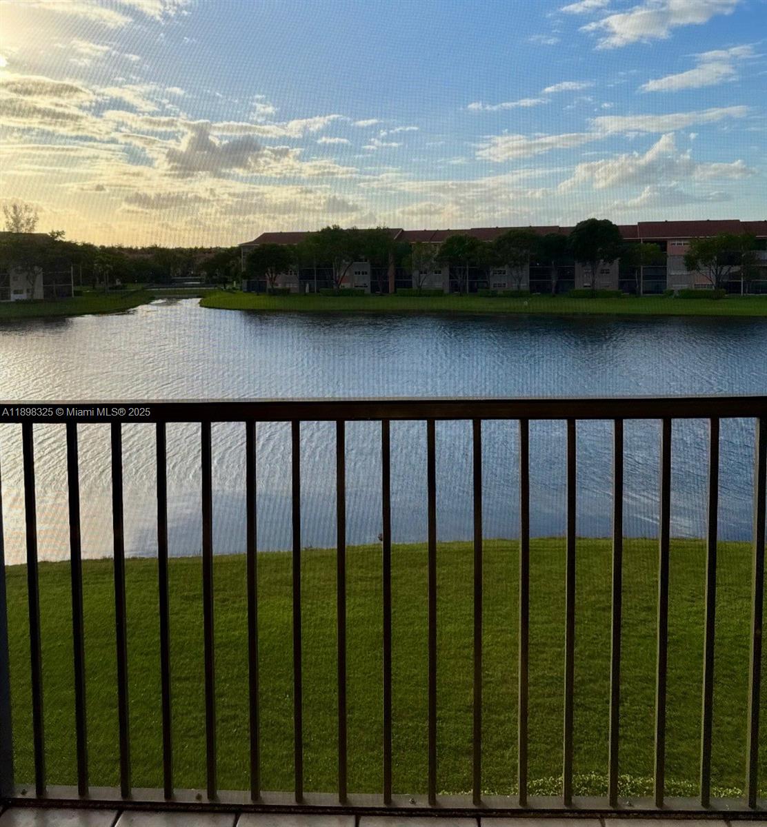 850 Southwest 138th Avenue, Unit 410D Pembroke Pines, FL 33027 - Photo 25 of 29 a view of a city from a balcony