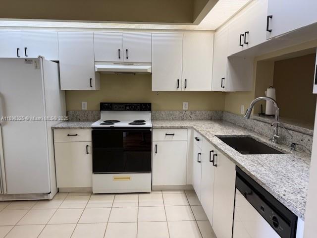 850 Southwest 138th Avenue, Unit 410D Pembroke Pines, FL 33027 - Photo 3 of 29 a kitchen with stainless steel appliances granite countertop a sink stove and refrigerator