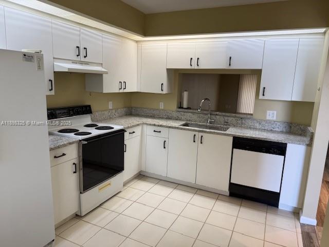 850 Southwest 138th Avenue, Unit 410D Pembroke Pines, FL 33027 - Photo 4 of 29 a kitchen with stainless steel appliances a sink stove and cabinets