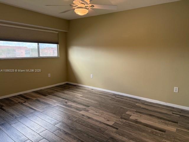 850 Southwest 138th Avenue, Unit 410D Pembroke Pines, FL 33027 - Photo 9 of 29 a view of empty room with wooden floor