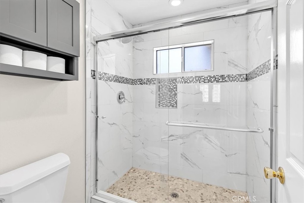 11 Finca San Clemente, CA 92672 - Photo 19 of 55 a bathroom with a shower and a toilet