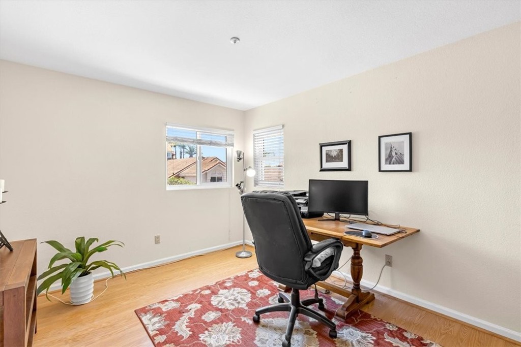 11 Finca San Clemente, CA 92672 - Photo 23 of 55 a workspace with furniture and rug