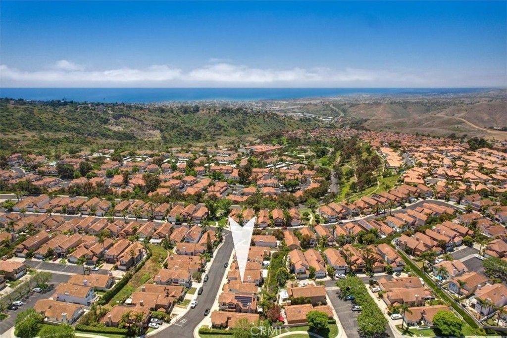 11 Finca San Clemente, CA 92672 - Photo 34 of 55 an aerial view of residential building with parking space