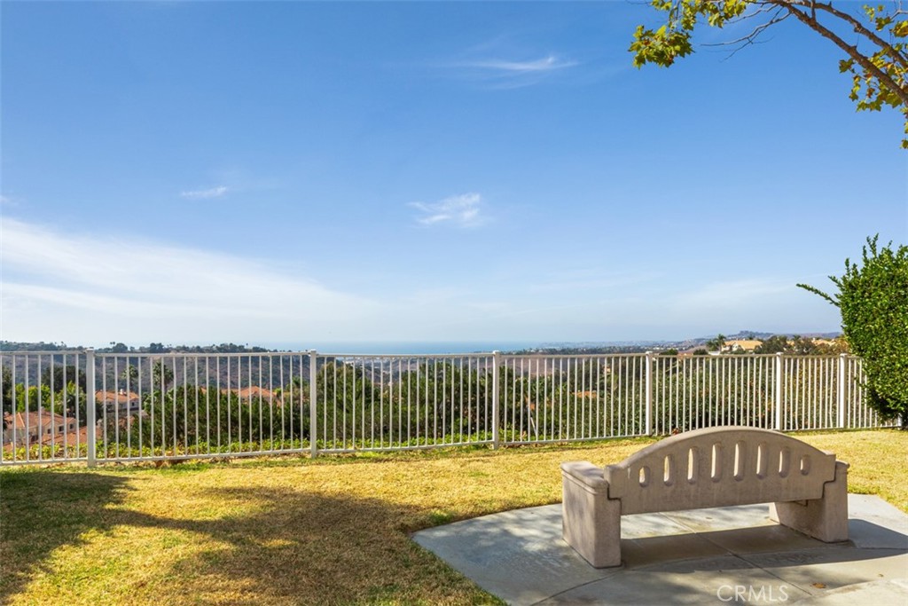 11 Finca San Clemente, CA 92672 - Photo 40 of 55 a view of balcony with wooden floor and fence
