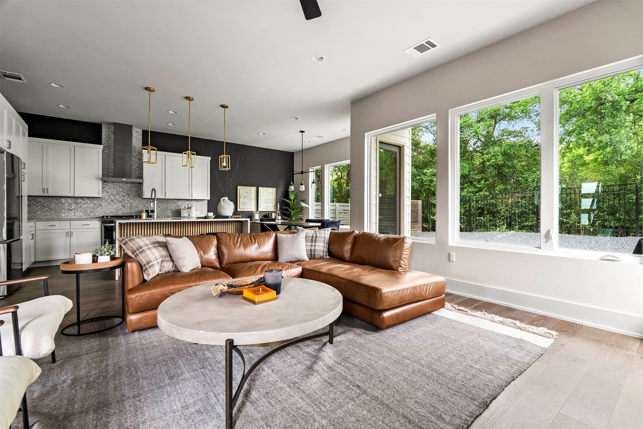 5200 Pink Poppy Pass Austin, TX 78735 - Photo 11 of 38 Ten-foot ceilings and 7-inch wide plank oak hardwoods create a spacious, high-end feel throughout the main level