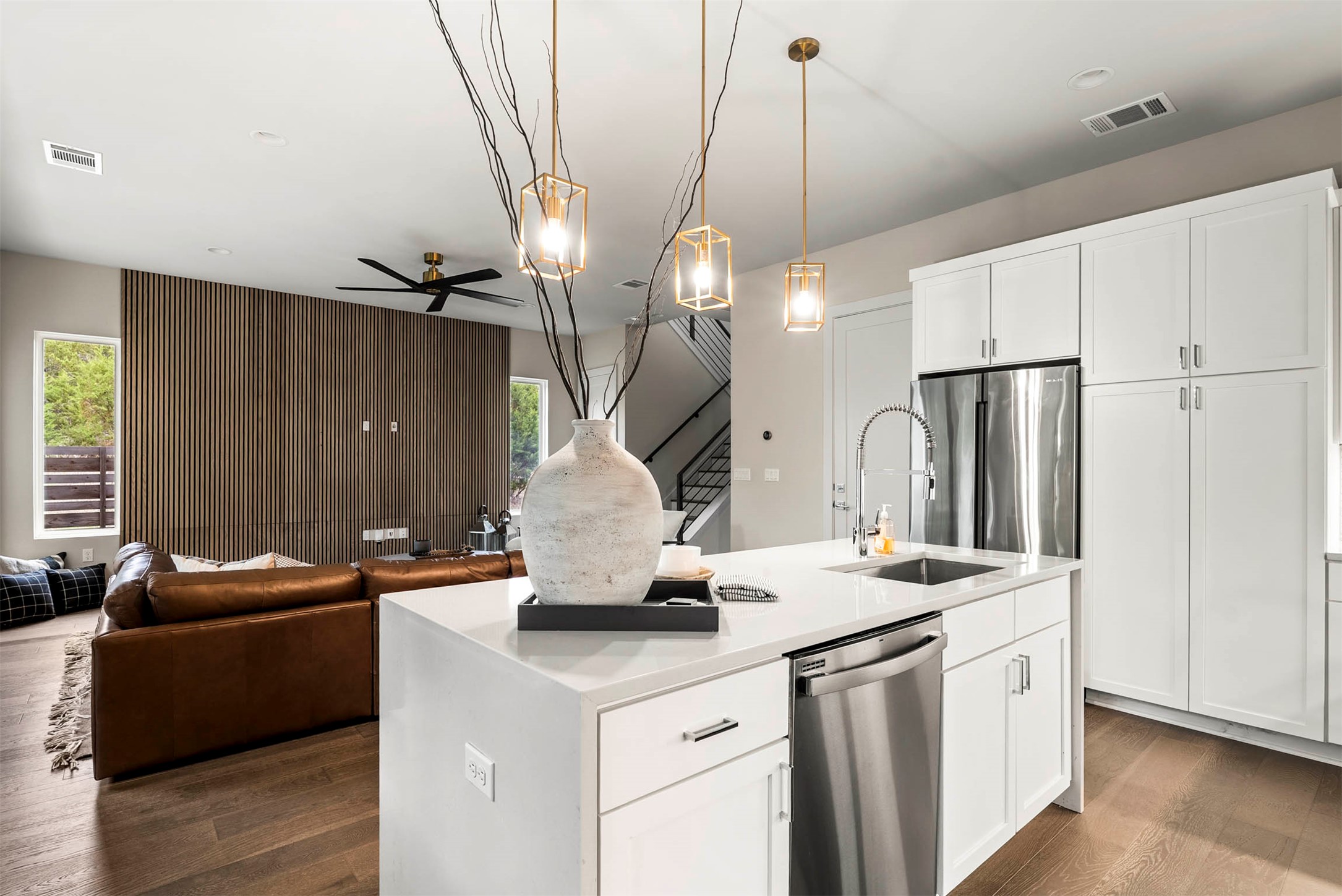 5200 Pink Poppy Pass Austin, TX 78735 - Photo 18 of 38 This kitchen is designed for social interaction, keeping you connected to the dining and living areas while you cook