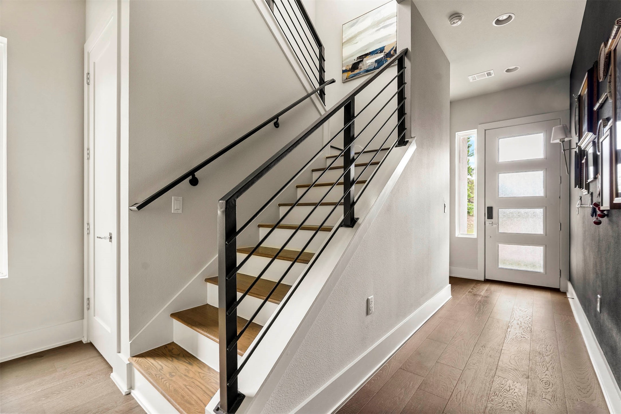 5200 Pink Poppy Pass Austin, TX 78735 - Photo 20 of 38 Head upstairs to the second level, where the oak flooring continues and the layout opens into a versatile landing