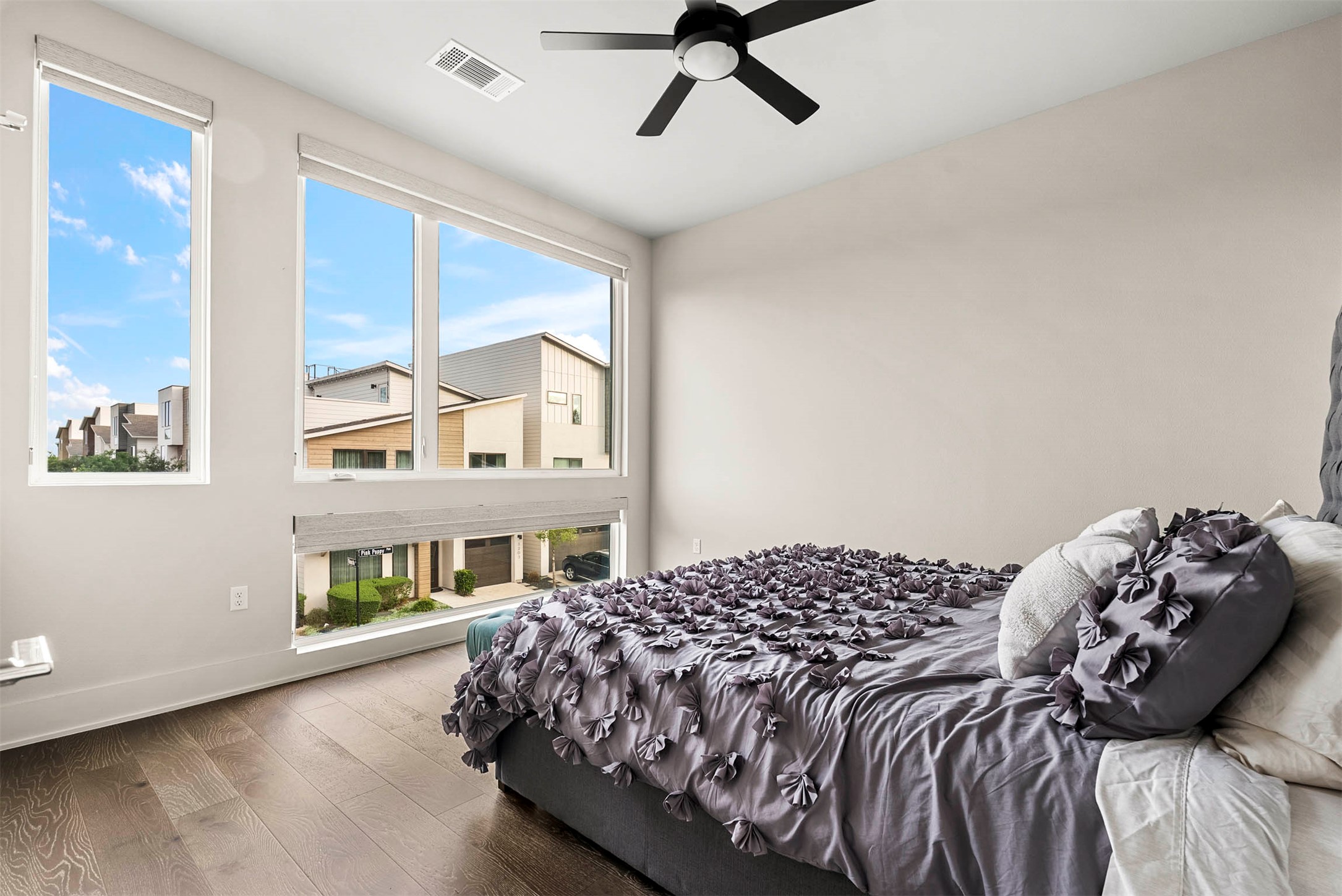 5200 Pink Poppy Pass Austin, TX 78735 - Photo 27 of 38 Two additional bedrooms on the second floor offer large windows and consistent high-end finishes for family or guests