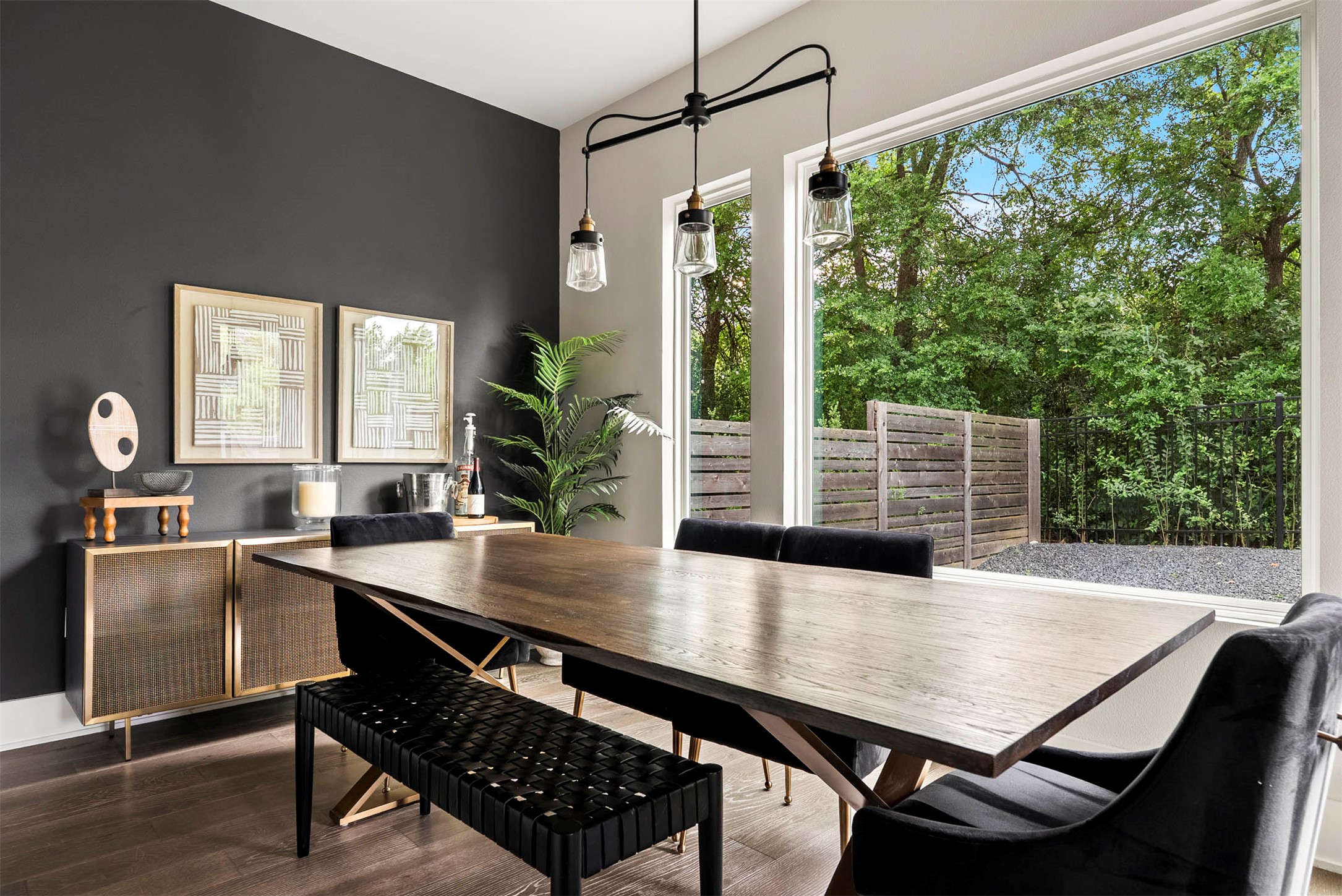 5200 Pink Poppy Pass Austin, TX 78735 - Photo 4 of 38 The dining area sits adjacent to a glass backdoor, providing a direct transition to the patio for indoor-outdoor dining
