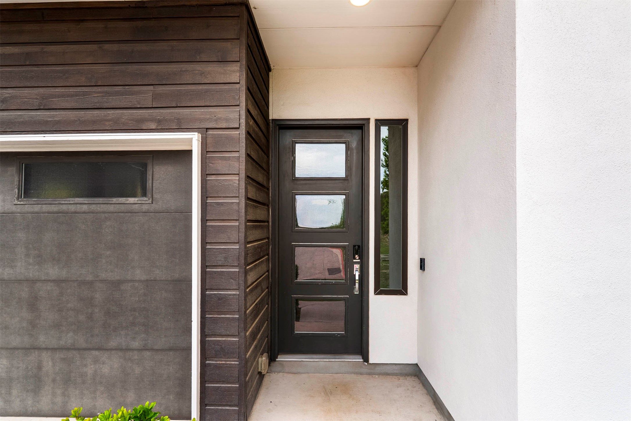 5200 Pink Poppy Pass Austin, TX 78735 - Photo 10 of 38 The sleek exterior architecture of this Cayena residence hints at the high-end upgrades and nature-focused design found inside