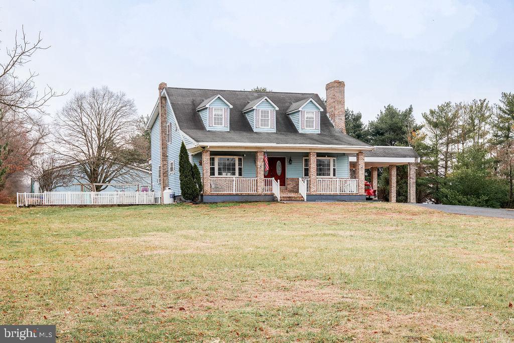 a front view of house with outdoor space