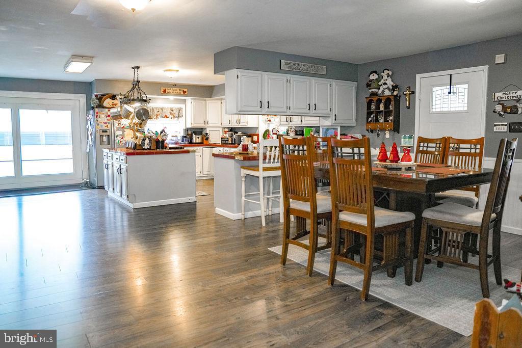 76 Northville Road Bridgeton, NJ 08302 - Photo 33 of 63 a view of a dining room with furniture and wooden floor