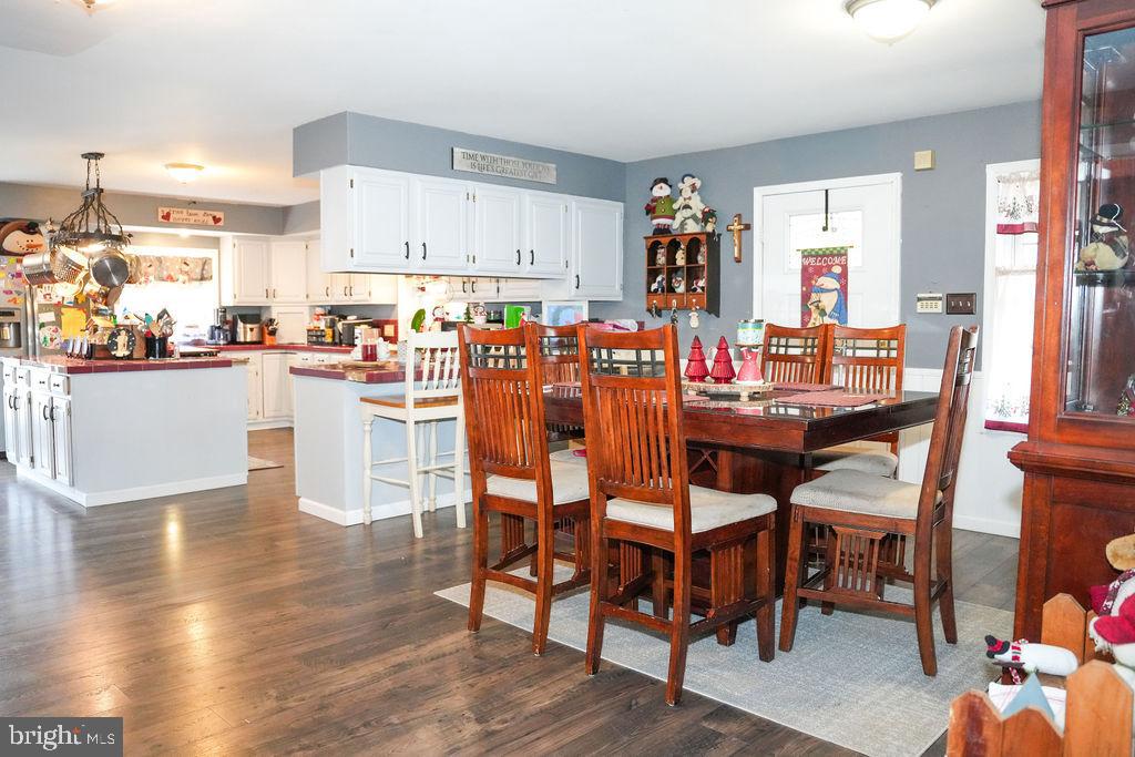 76 Northville Road Bridgeton, NJ 08302 - Photo 34 of 63 a view of a dining room with furniture and wooden floor