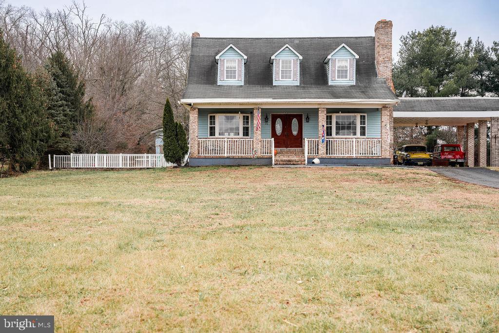 76 Northville Road Bridgeton, NJ 08302 - Photo 5 of 63 a view of a building with a garden and trees