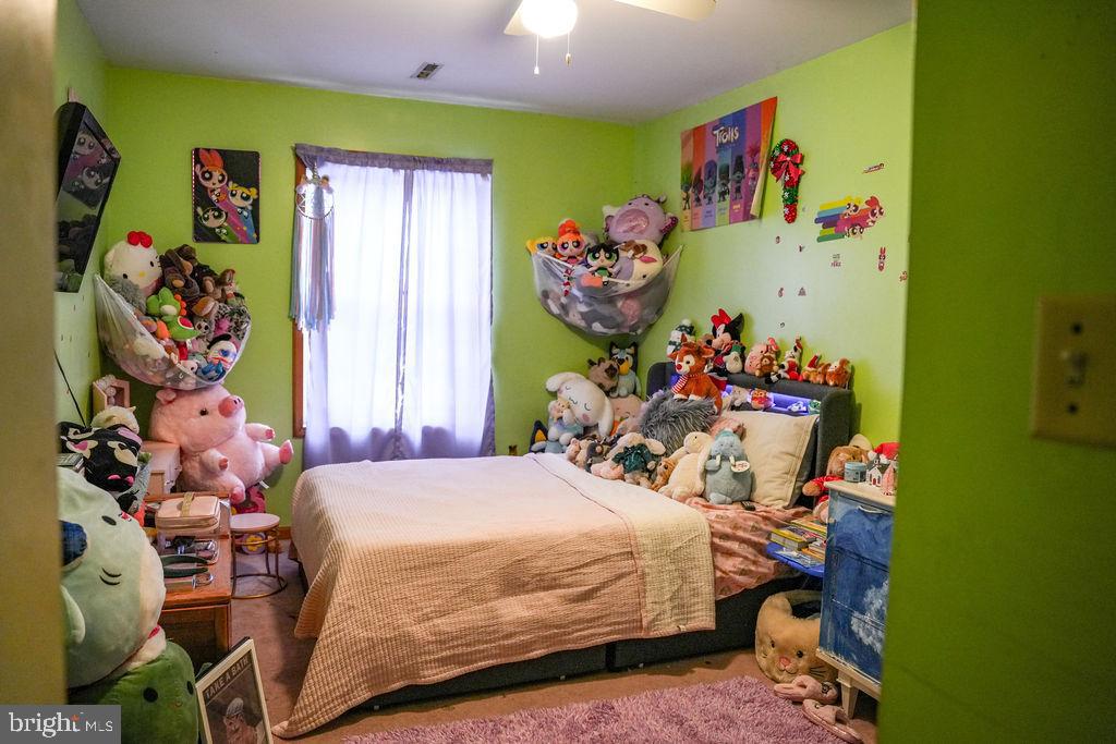 76 Northville Road Bridgeton, NJ 08302 - Photo 52 of 63 a bedroom with a bed and a window