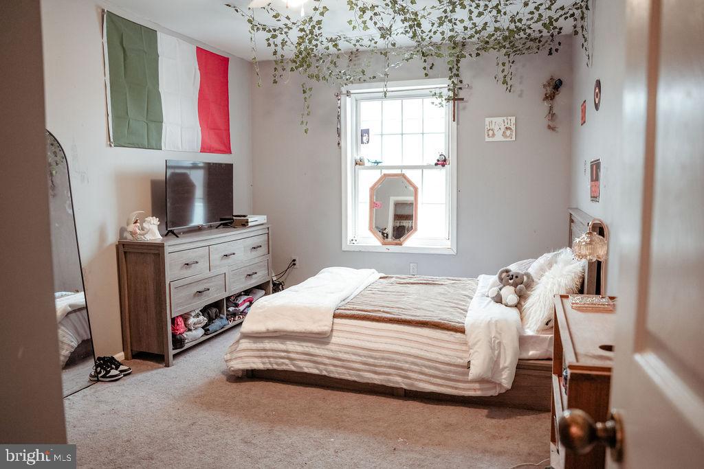76 Northville Road Bridgeton, NJ 08302 - Photo 54 of 63 a bedroom with a bed and a window
