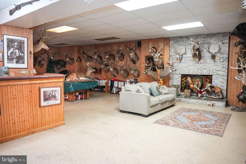 76 Northville Road Bridgeton, NJ 08302 - Photo 59 of 63 a living room with furniture and a fireplace