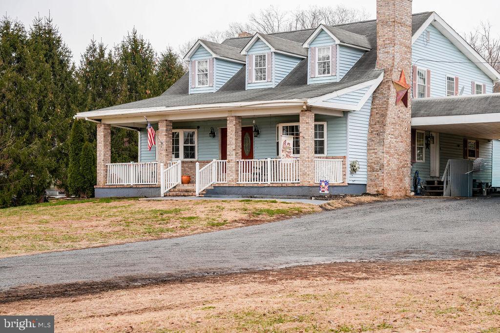 76 Northville Road Bridgeton, NJ 08302 - Photo 10 of 63 a front view of a house with a yard and garage