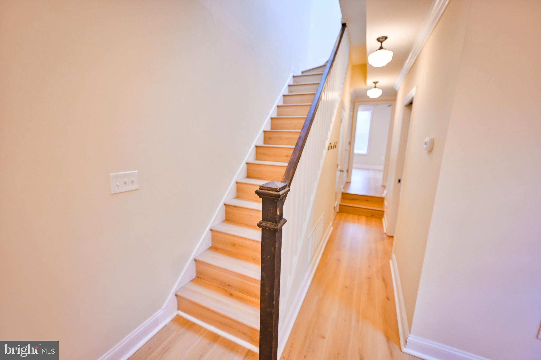 907 Stiles Street, Unit B Baltimore, MD 21202 - Photo 17 of 26 Stairs to 2nd level
