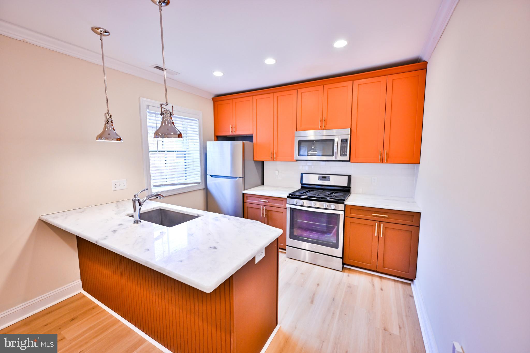 907 Stiles Street, Unit B Baltimore, MD 21202 - Photo 3 of 26 Updated Kitchen
