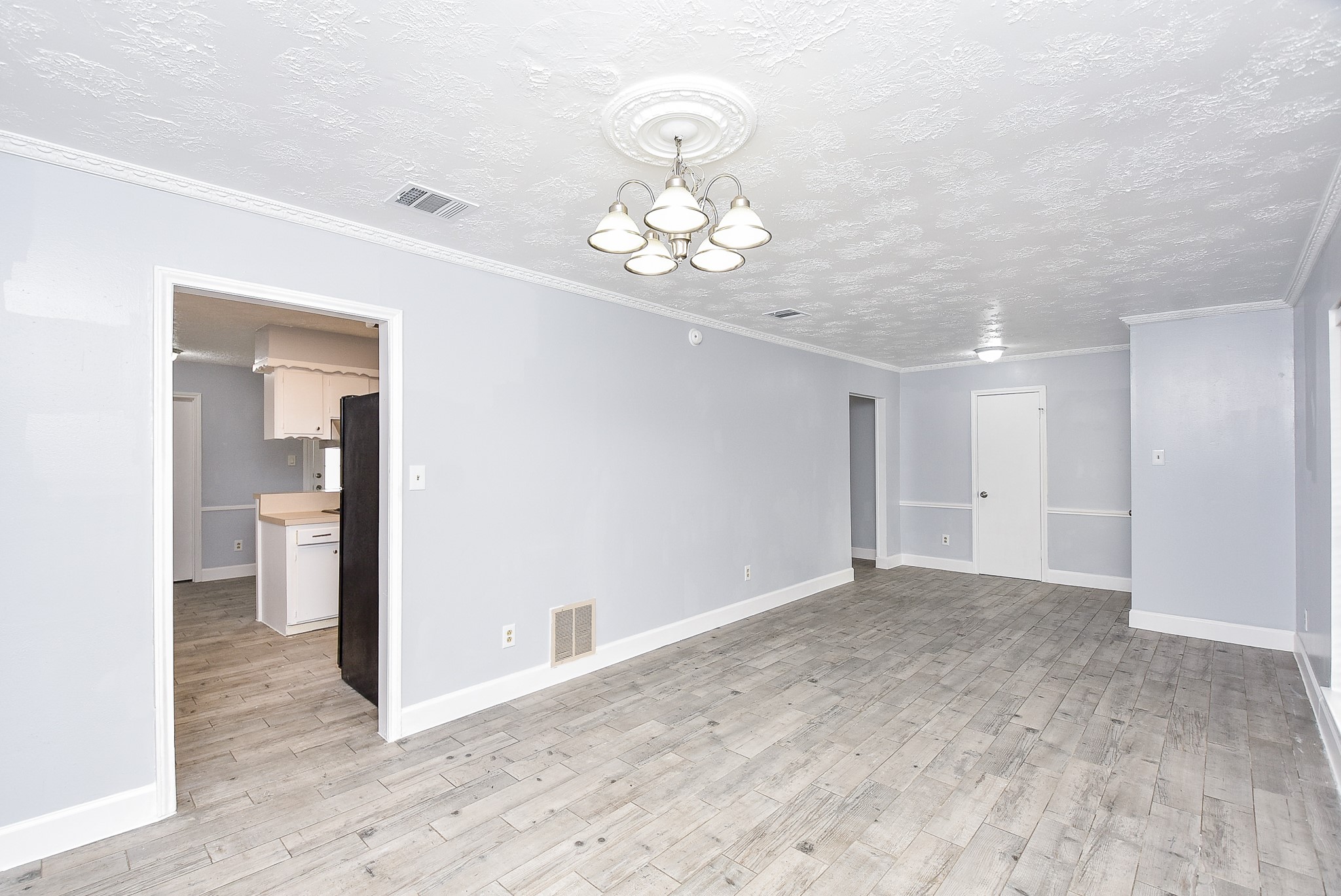 11623 Kirkhollow Drive Houston, TX 77089 - Photo 11 of 32 a view of an empty room with wooden floor
