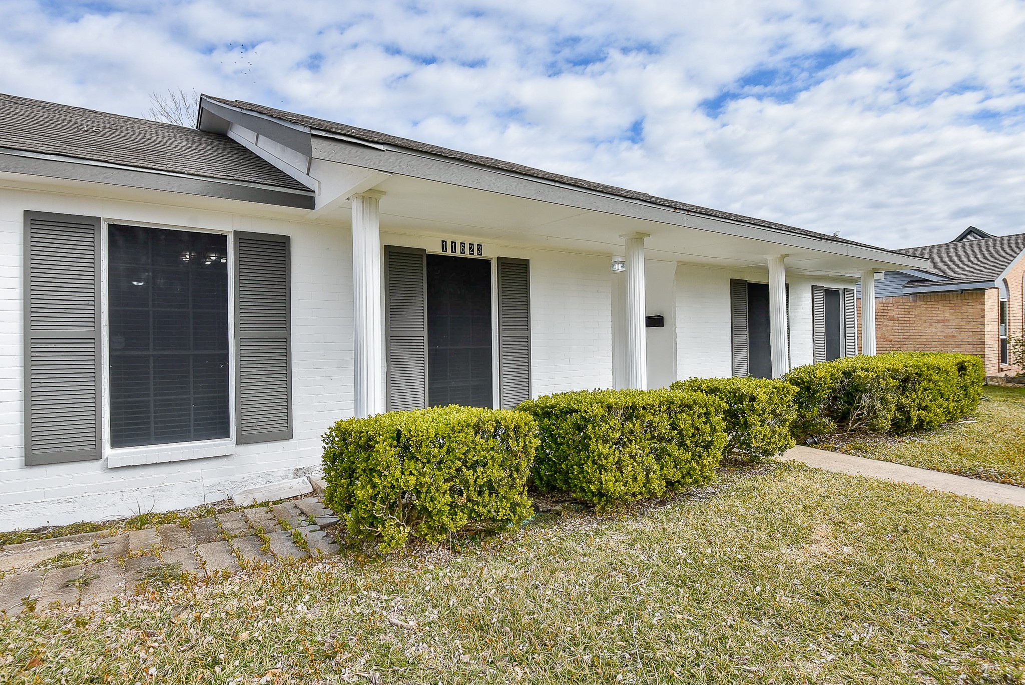 11623 Kirkhollow Drive Houston, TX 77089 - Photo 6 of 32 a view of a house with potted plants in front of it