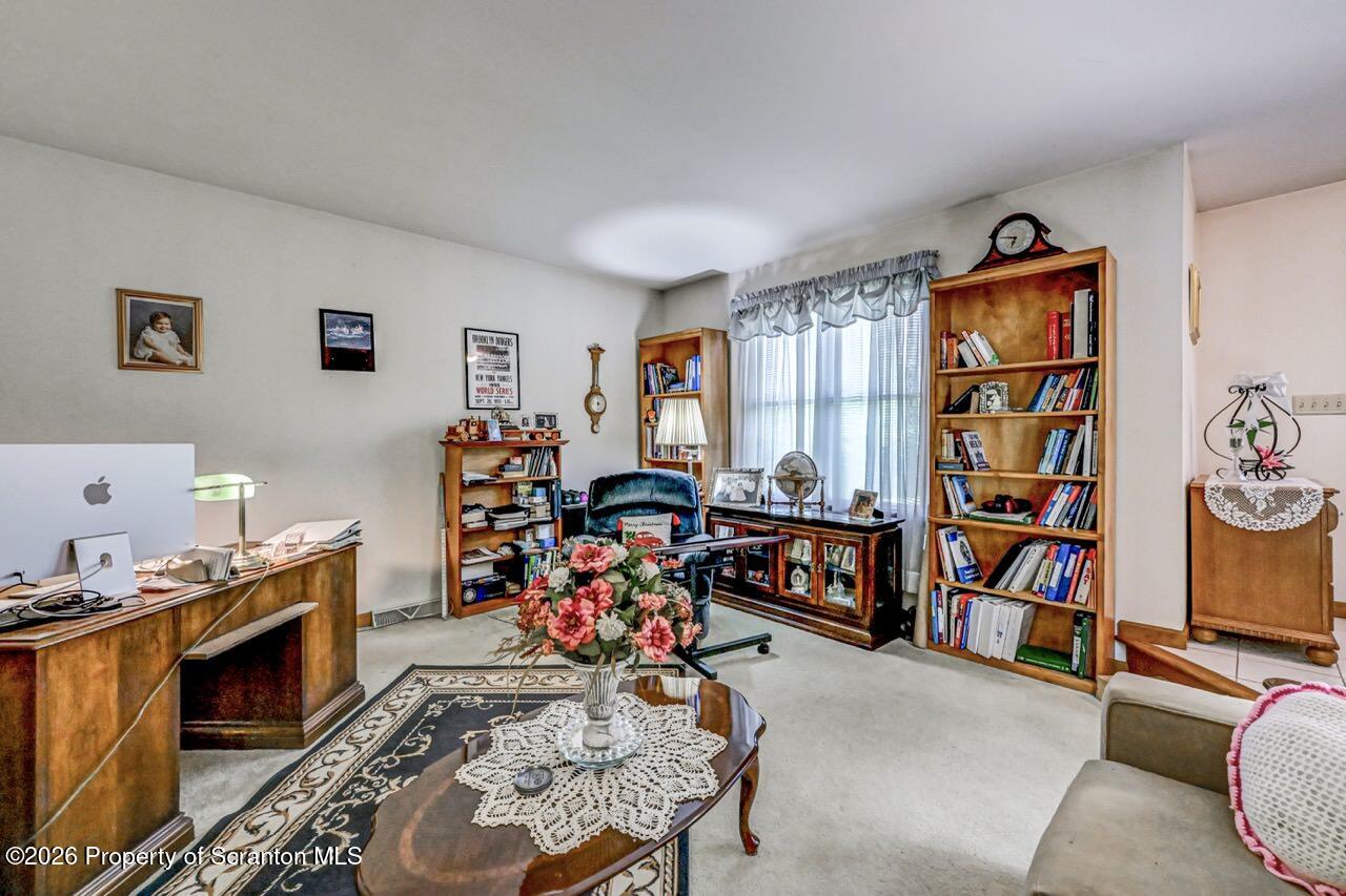 314 Reynolds Road Factoryville, PA 18419 - Photo 11 of 58 a view of a livingroom with furniture and toys