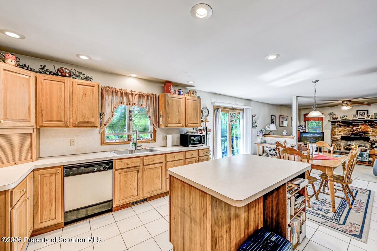 314 Reynolds Road Factoryville, PA 18419 - Photo 15 of 58 a kitchen with a stove a refrigerator and a sink