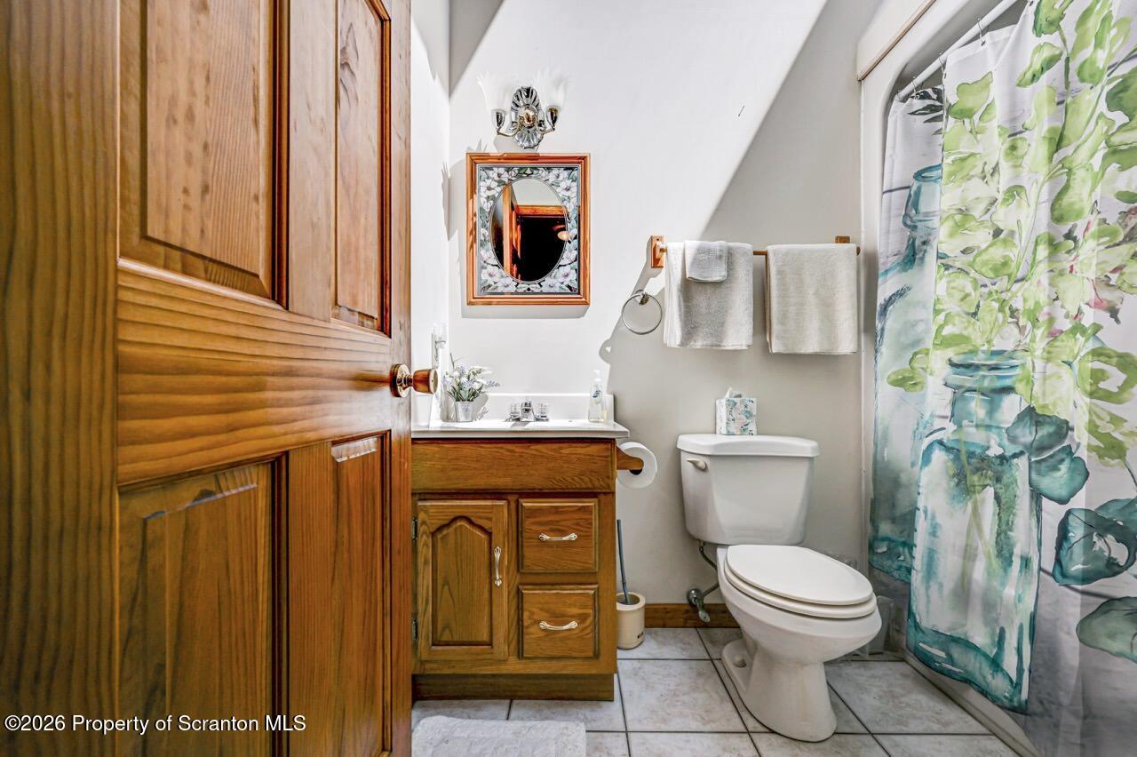 314 Reynolds Road Factoryville, PA 18419 - Photo 41 of 58 a bathroom with a toilet and a sink