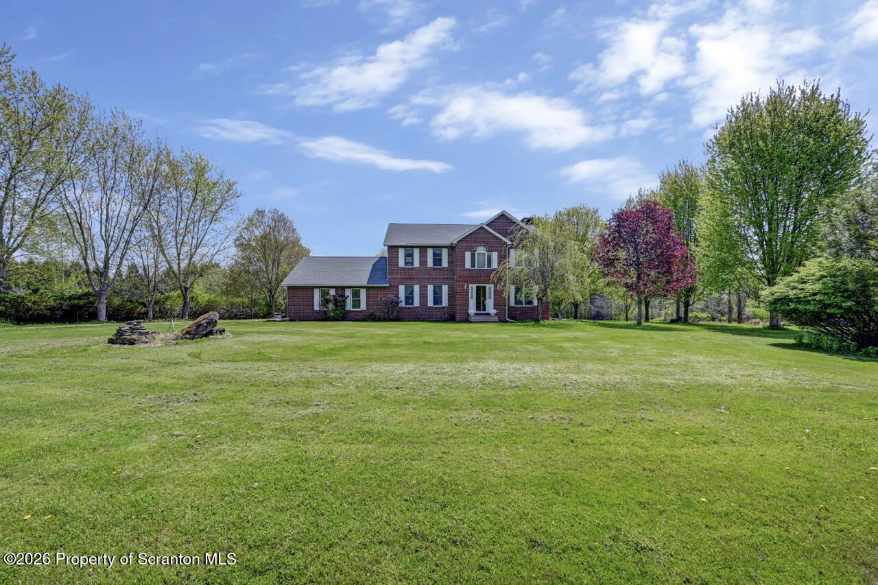 314 Reynolds Road Factoryville, PA 18419 - Photo 50 of 58 a view of a house with a big yard